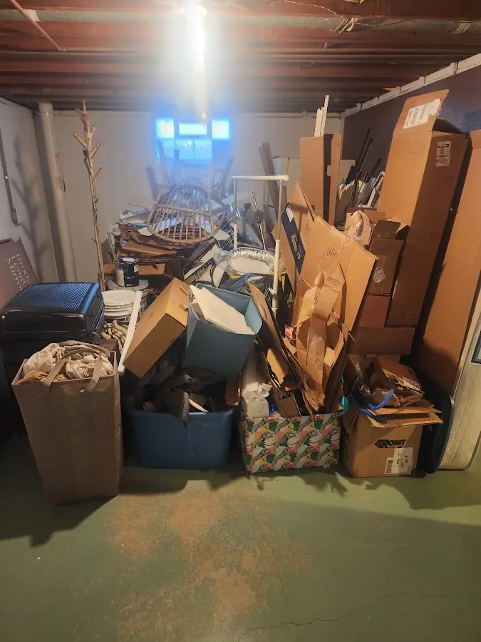 Roll-off dumpster container at job site for Yard Waste Dumpster Rental in Elmwood